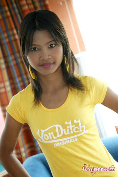 Sweet looking Thai teen is all smiles in the land of smiles